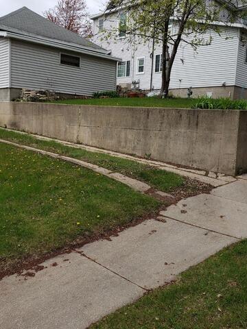 Failing Concrete Retaining Wall Restored & Stabilized in Berlin, WI - Before Photo