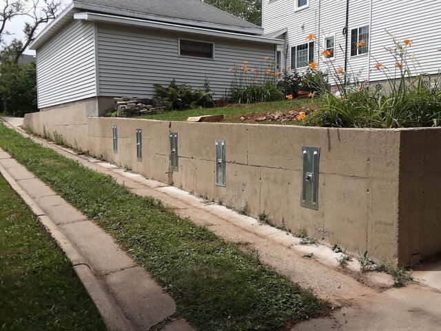 Failing Concrete Retaining Wall Restored & Stabilized in Berlin, WI - After Photo