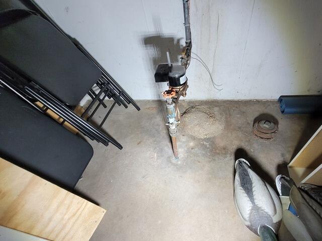 Battery Back-up Sump Pump & Drainage System Eliminates Wet Basement Issues in Berlin, WI - Before Photo