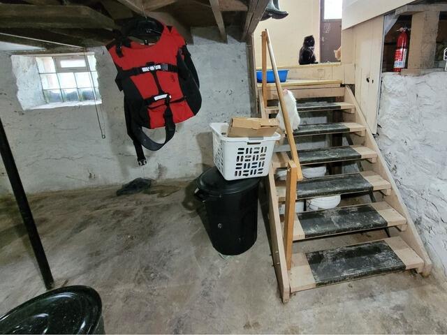 Basement Water & Humidity Issues Resolved with Sump Pump, Drainage & Humidifier Upgrades in Berlin, WI - Before Photo