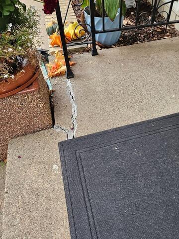 Cracked and Sinking Concrete Patio Steps Repaired & Joints Filled in Rothschild, WI - Before Photo