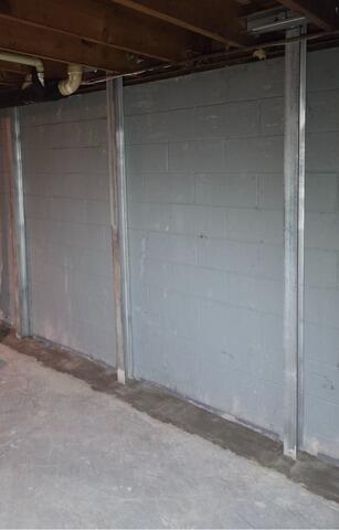 Failing Foundation with Stair-Step Cracking is Repaired & Stabilized in Kingsford, MI - After Photo