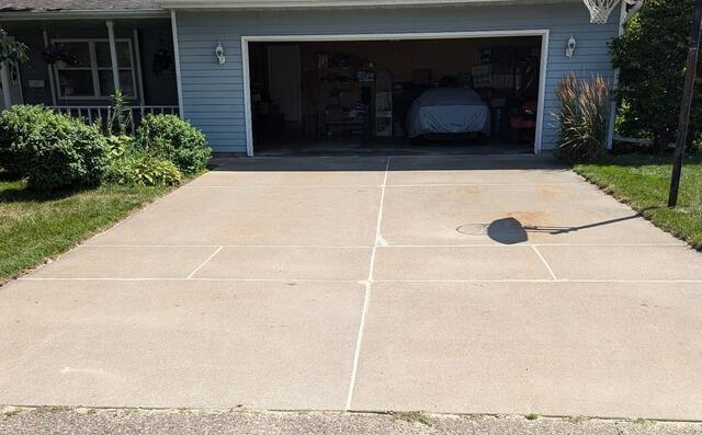 Settling, Uneven Concrete Driveway  Lifted, Repaired & Sealed in Wausau, WI - After Photo