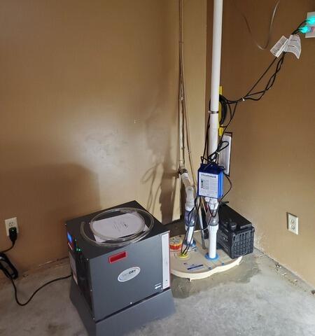 Sump Pump with Battery Back-up & Dehumidification System Eliminate Moisture Issues in Little Suamico, WI - After Photo
