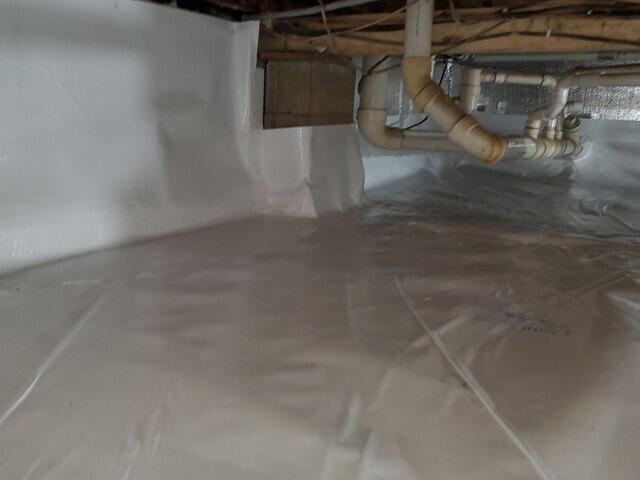Crawl Space Vapor Barrier Encapsulation & Sump Pump Installation in Oconto, WI - After Photo