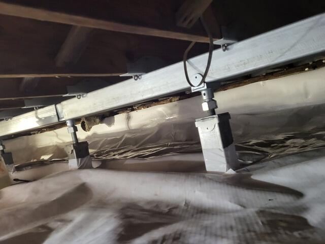 Musty, Damp Crawl Space and Floor Joists Repaired & Stabilized in Oconto, WI - After Photo