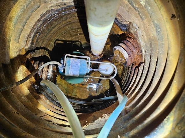 Sump Pump with Battery Back-Up in Oconto, WI - Before Photo