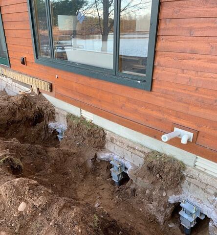 Settling, Failing Foundation Repaired and Stabilized with Piering System in Minocqua, WI - After Photo