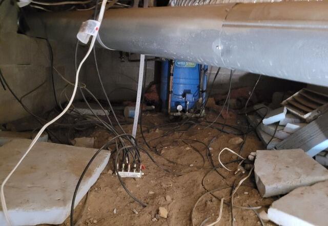 Crawl Space Moisture & Odor Issues Resolved with Vapor Barrier System in Minocqua, WI - Before Photo