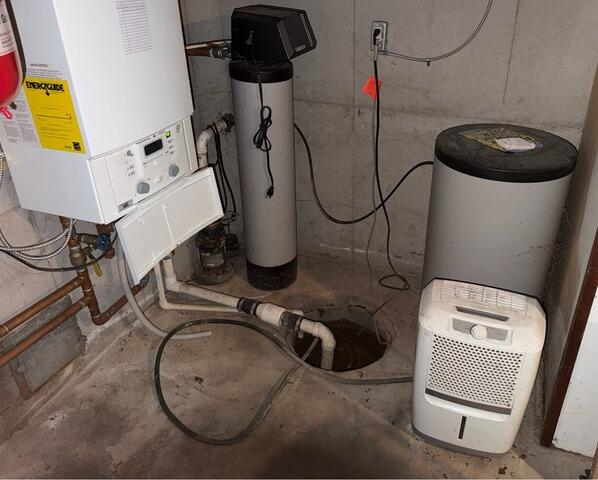 Sump Pump Replacement and Insulation Installation in Green Bay, WI - Before Photo