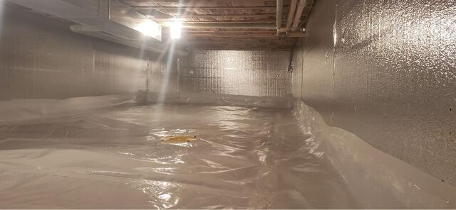 Crawl Space Encapsulation & Insulation Under Home Addition in Antigo, WI - After Photo