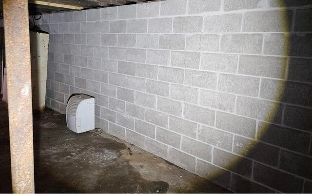 Block Foundation Wall Repair with Wall Anchors in Merrill, WI - Before Photo