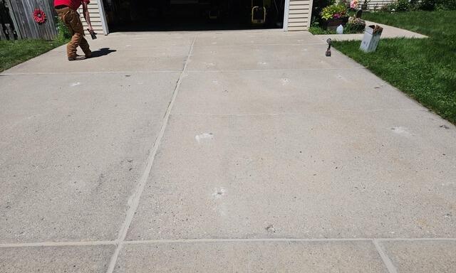 Badly Cracked and Sunken Concrete Driveway Repair in Green Bay, WI - After Photo