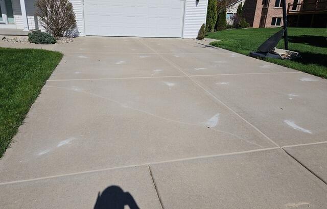 Sunken Driveway and Front Walkway Repaired in De Pere, WI - After Photo