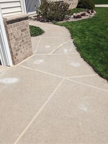 Uneven Driveway and Front Sidewalk Repaired in De Pere, WI - After Photo