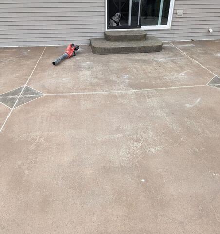 Decorative Stamped Concrete Patio Lifted, Repaired & Sealed in De Pere, WI - After Photo