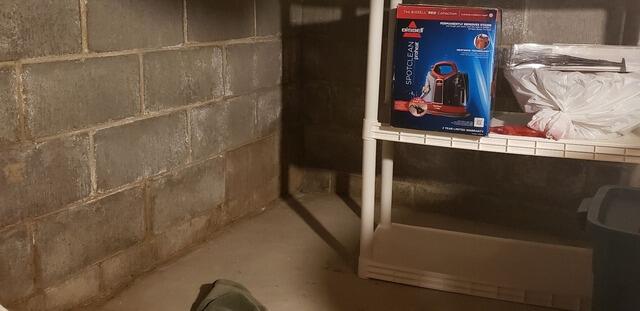 Basement Waterproofing & Sump Pump Install in De Pere, WI - Before Photo