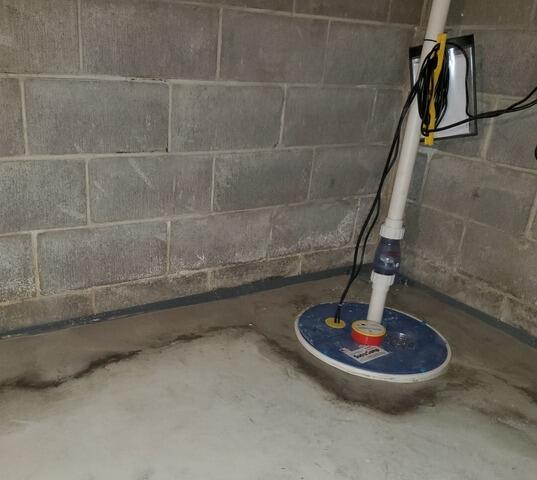 Basement Waterproofing & Sump Pump Install in De Pere, WI - After Photo