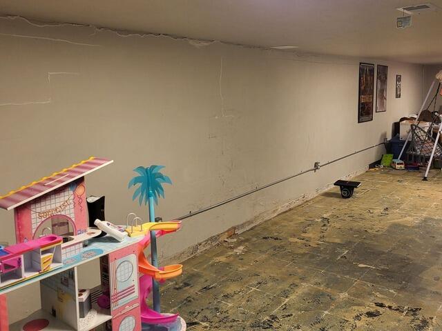 Failing Foundation Wall Repaired After Previous Patch Failed in De Pere, WI - Before Photo