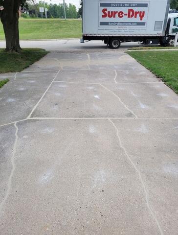 Badly Cracked and Uneven Driveway Repaired in Denmark, WI - After Photo