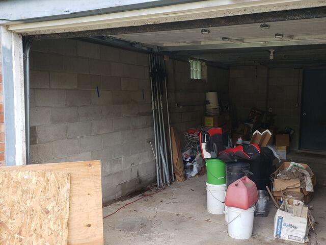 Garage Foundation Wall Stabilized in Denmark, WI - Before Photo