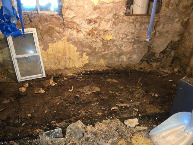 Failing Fieldstone Basement Walls Repaired & Moisture Controlled in Denmark, WI - Before Photo
