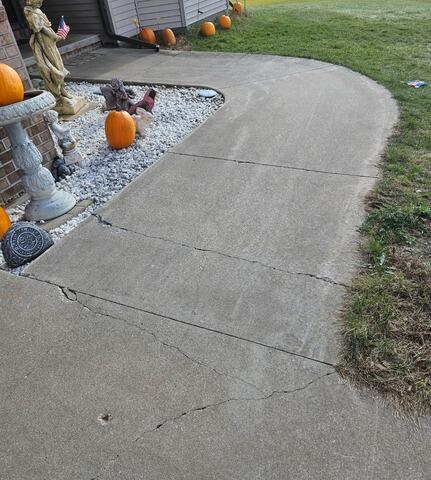 Sunken Concrete Lifted and Sealed in Pulaski, WI - Before Photo