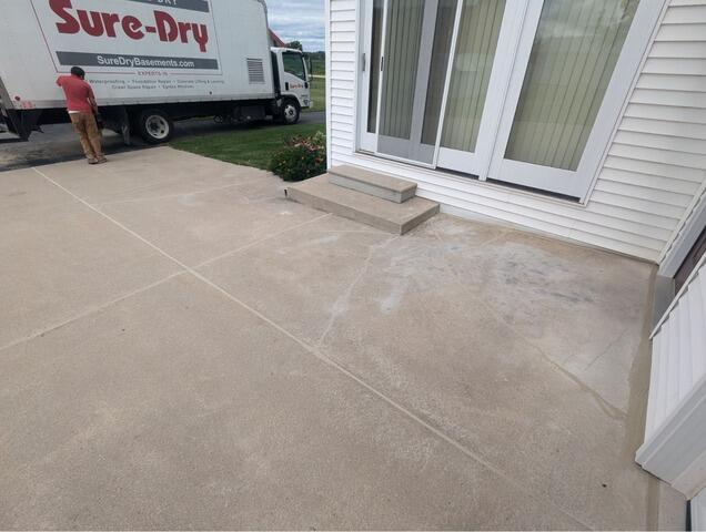 Sunken Driveway and Concrete Steps Repaired in Pulaski, W - After Photo