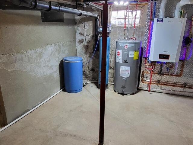 Wet Basement Waterproofed in Pulaski, WI - Before Photo