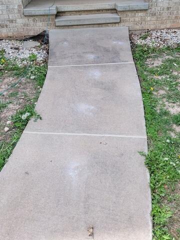 Uneven Concrete Driveway and Front Walkway Repaired in Wrightstown, WI - After Photo
