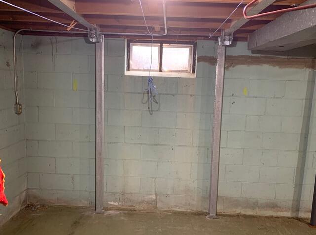 Stair-Step Foundation Wall Cracks Stabilized with Steel Bracing in Appleton, WI - After Photo