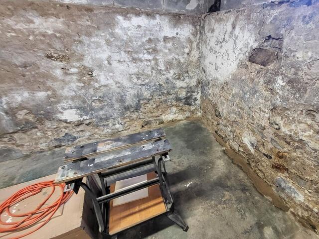 Fieldstone Basement Waterproofing and Moisture Control in Appleton, WI - Before Photo