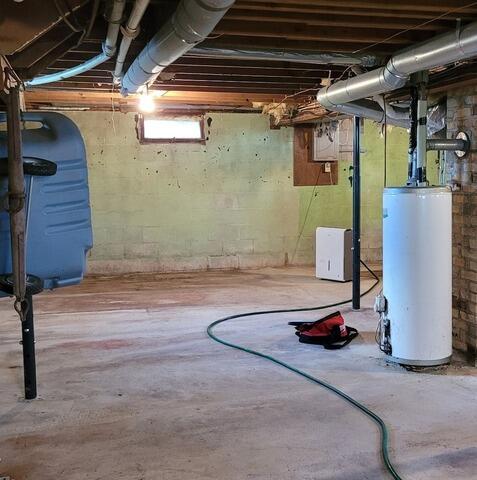 Basement Waterproofing with Vaper Barrier, Drainage and Sump Pump Upgrade in Bear Creek, WI - Before Photo