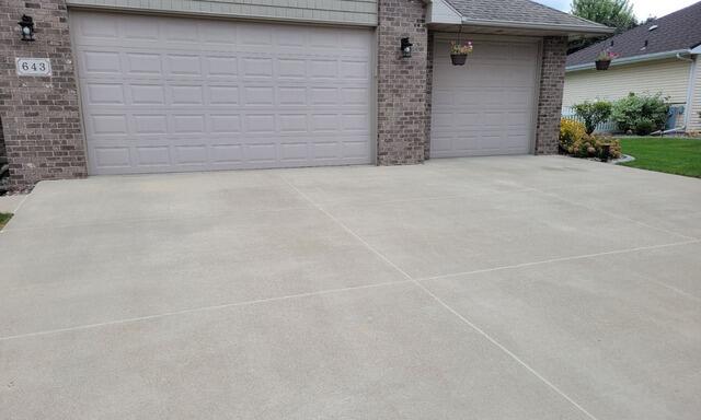 Concrete Driveway and Front Sidewalk Leveling & Joint Sealing in Combined Locks, WI - After Photo