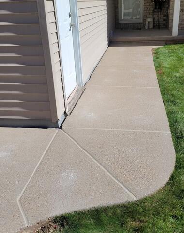 Concrete Driveway and Curved Sidewalk Leveling and Crack Repair in Combined Locks, WI - After Photo