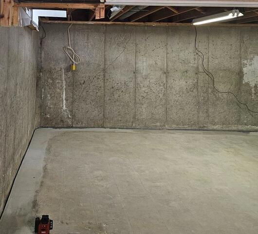 Poured Concrete Foundation Wall Repair with GeoLock Anchors in Combined Locks, WI - Before Photo