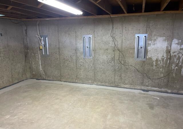 Poured Concrete Foundation Wall Repair with GeoLock Anchors in Combined Locks, WI - After Photo