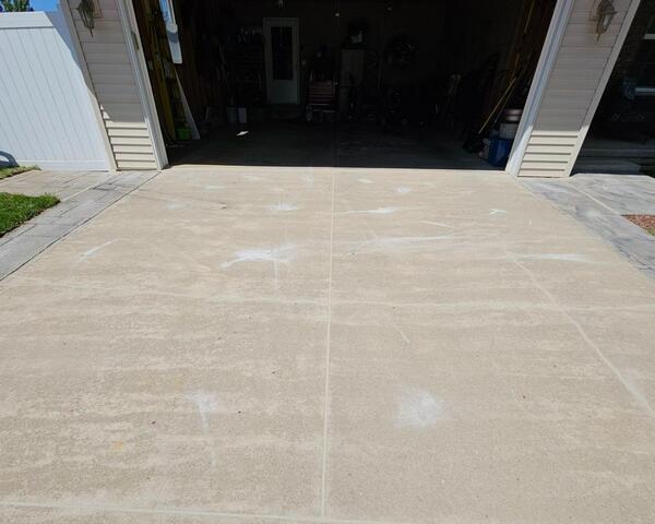 Cracked and Uneven Driveway and Sidewalk Repaired in Pulaski, WI - After Photo