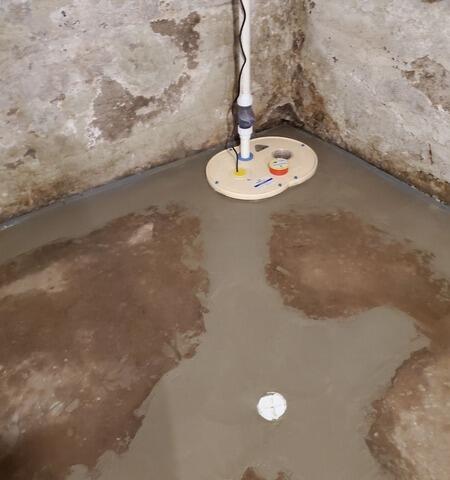 Wet Basement Waterproofed With Interior Drainage and Sump Pump in Little Chute, WI - After Photo
