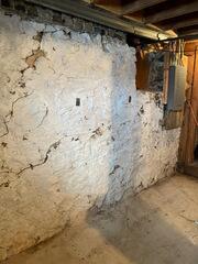 Crumbling & Cracking Fieldstone Basement Wall Repaired & Stabilized in Rhinelander, WI