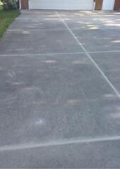 Concrete Driveway Settling Repaired & Sealed In Marathon, WI