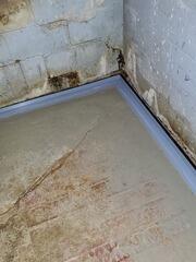 Wet Basement With Extreme Water Seepage Has Sump Pump System Installed In Wautoma, WI