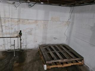 Wet Basement Contractor Installs Waterproofing System in Marinette, WI
