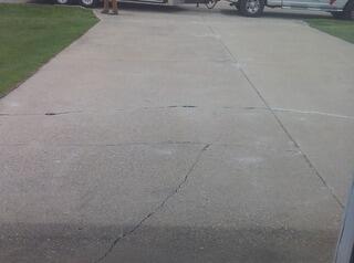 Concrete Driveway and Garage Floor Lifted, Leveled, and Sealed in Stephenson, MI