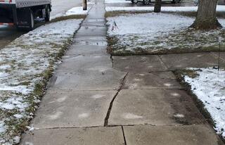 Cracked and Sunken Concrete Driveway Repaired in Lomira, WI