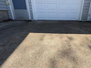 Concrete Driveway with Severe Sunken Slabs Repaired in Lowell, WI
