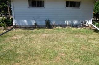 Wall Anchors Installed to Stabilize a Sinking Foundation in Merrill, Wisconsin
