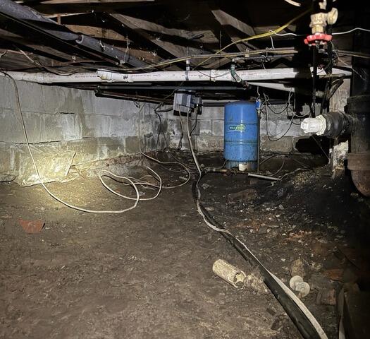 Wet Crawl Space Encapsulated in Arundel, ME - Before Photo