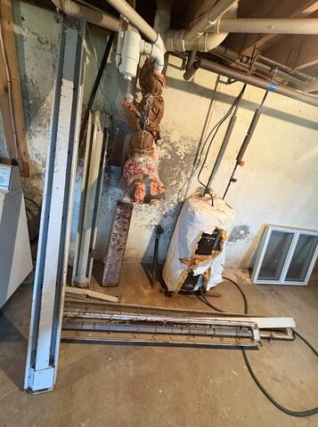 Standing Water in Manchester, ME Basement - Before Photo