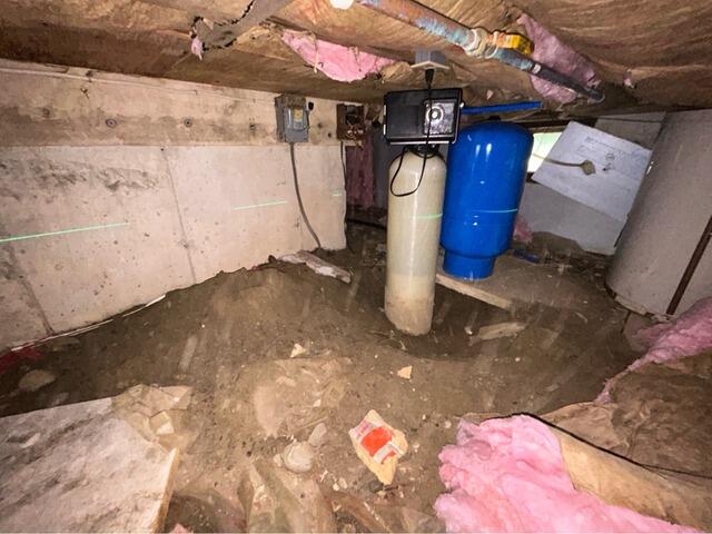 Installing Vapor Barrier and Insulation in a Tenants Harbor, Maine Crawl Space - Before Photo